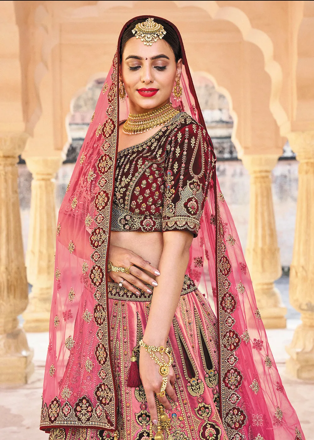 Pink & Maroon Bridal Wear Heavy Embroidered Silk Lehenga Choli